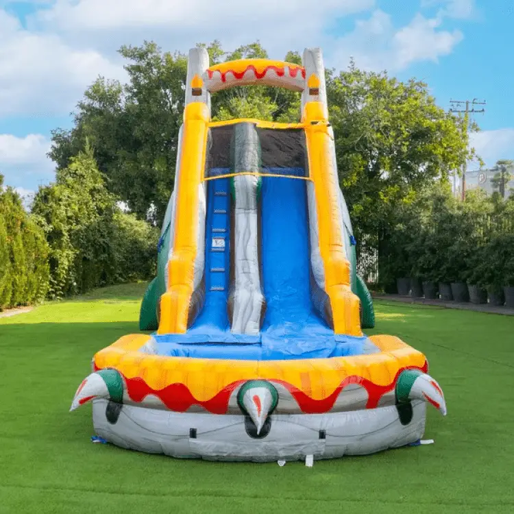 Yellow and blue inflatable water slide rental setup on grass